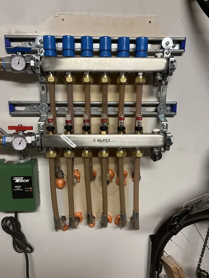 Plumber performing Gas Line Installation at a residential property in Celina